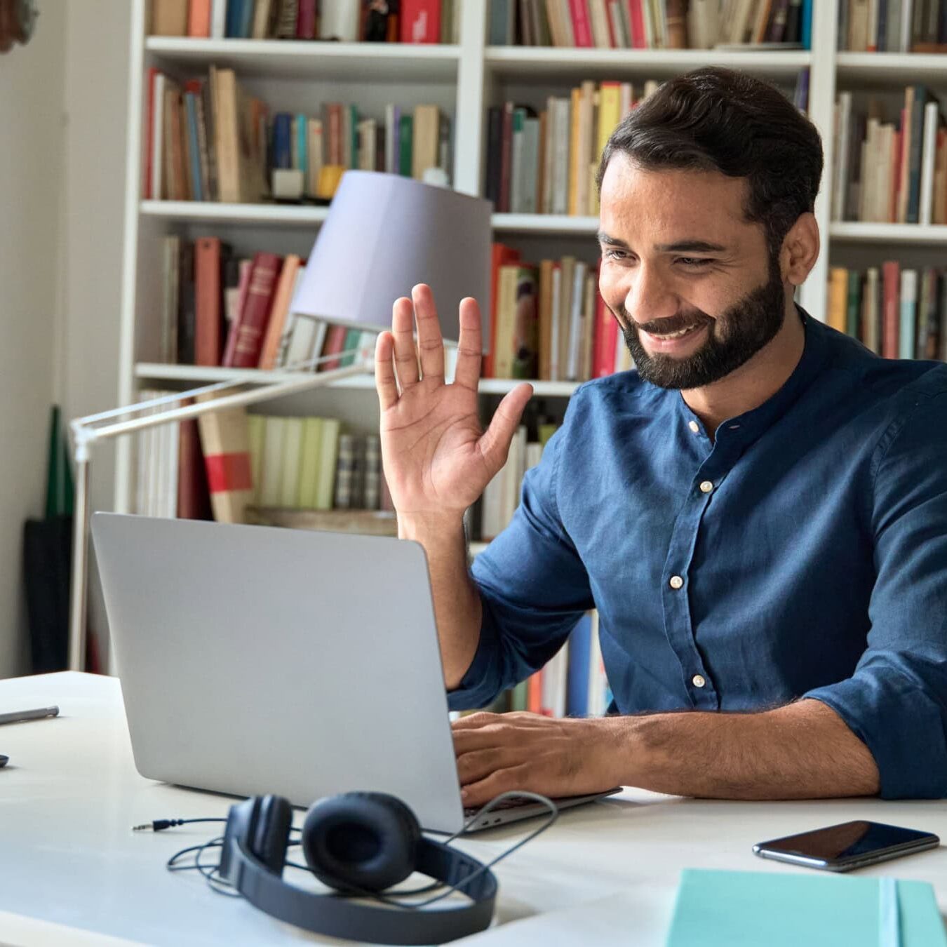 A man calls the ICF Ethics Assist line from his at home office.