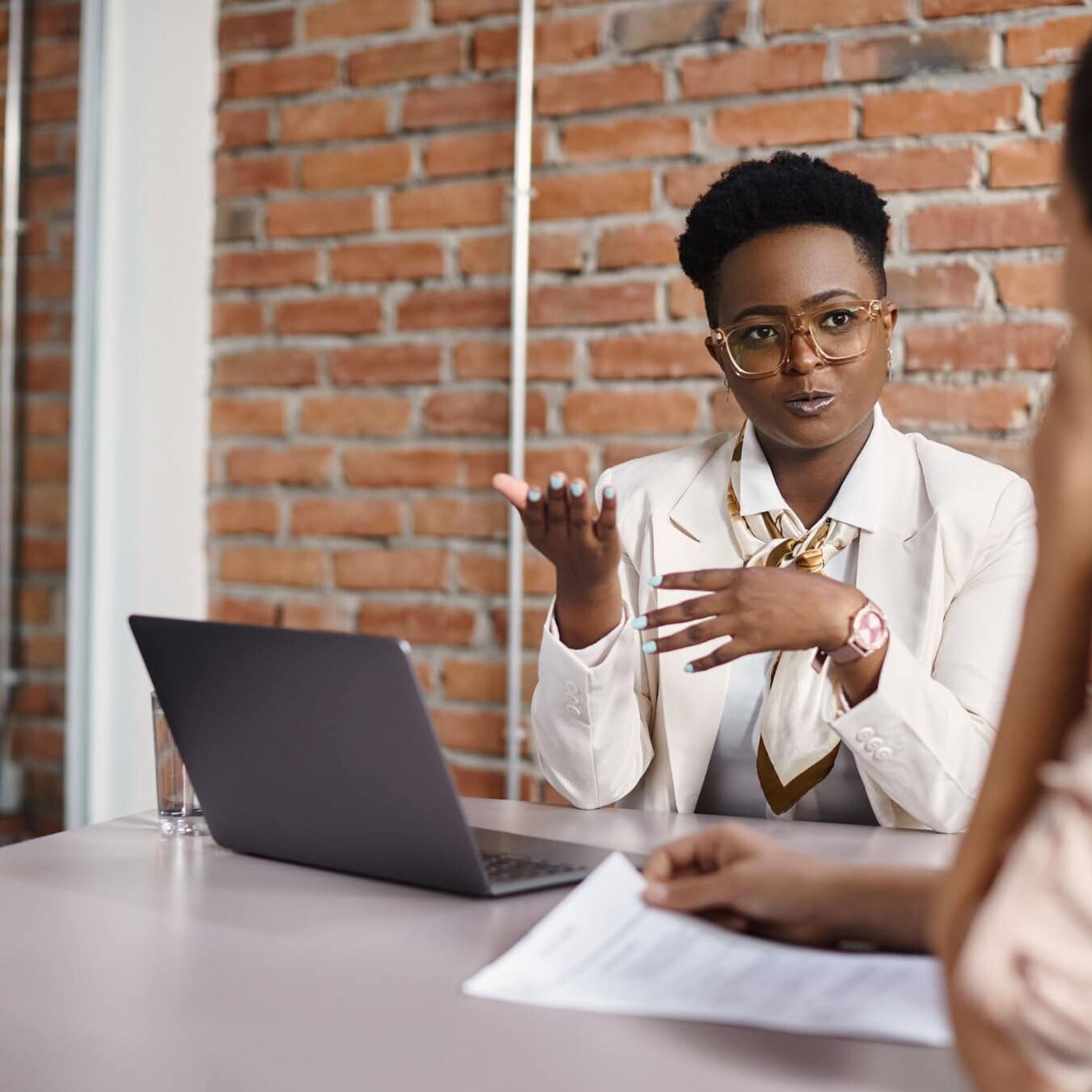 Online coaching educator conducting a virtual training session.