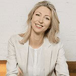 Headshot of Jurgita Micallef, PCC with the International Coaching Federation. With 20 years of experience across startups, government, and global enterprises, she empowers leaders worldwide.