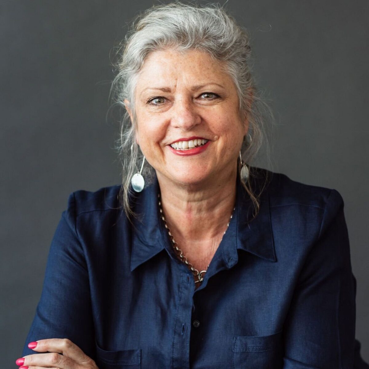 Headshot of Georgina + Woudstra, blog author with the International Coaching Federation. Known for being on the forefront of team coaching.