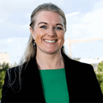 Headshot of Rosarii, PCC with the International Coaching Federation. Known for promoting coaching cultures and enhancing organizational engagement.