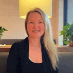 Headshot of Elena Vedernikova, ACC and AATC with the International Coaching Federation. Known for leadership development and optimizing organizational performance.